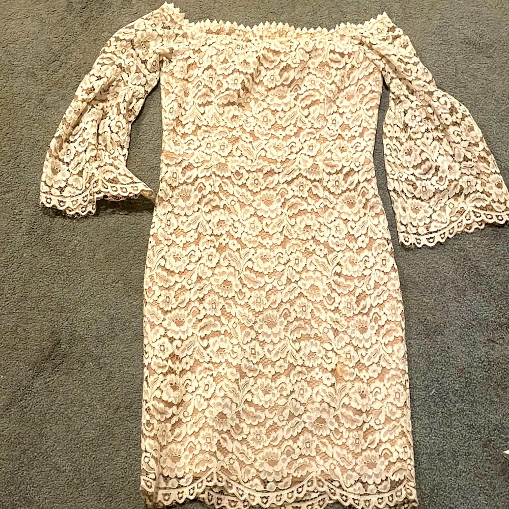 Beautiful cream/off white eyelet off the shoulder dress. Perfect for any event